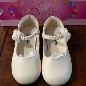 Girls jumping jacks shoes. Brand new never used.